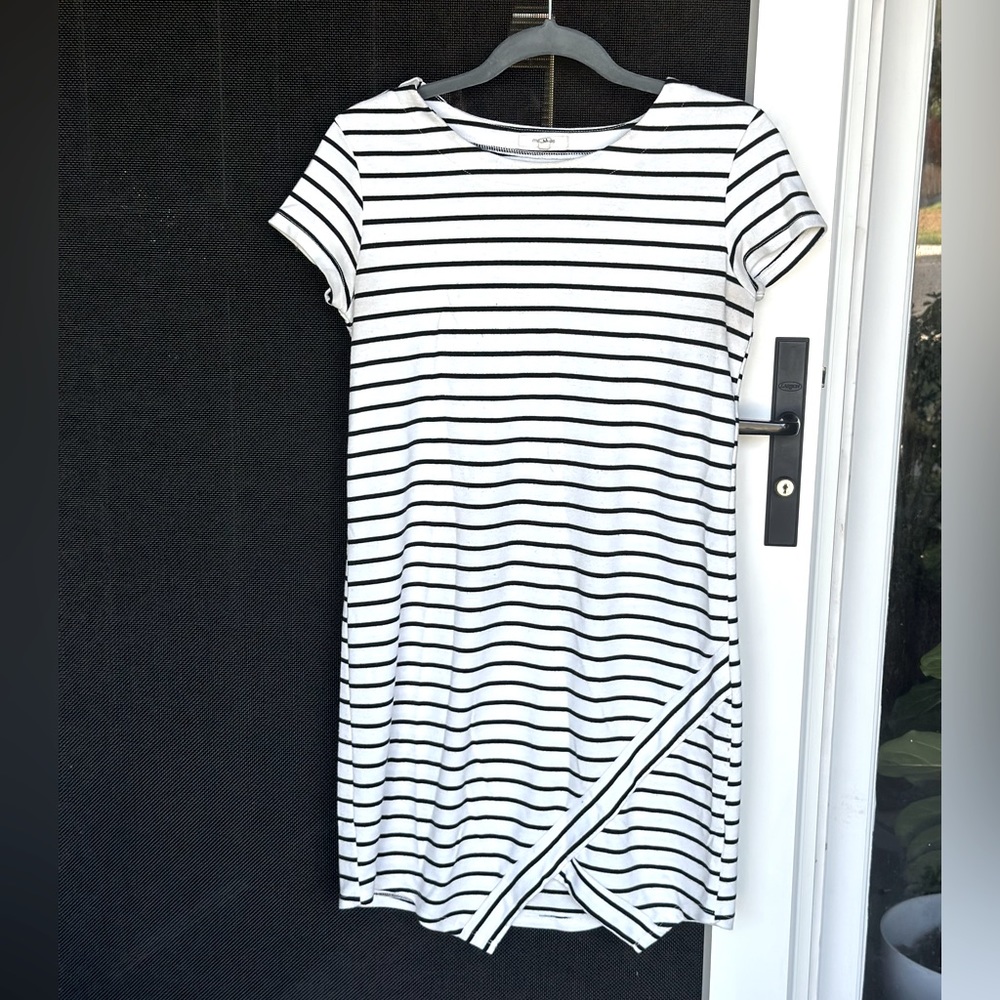 White and black stripped cotton dress with a small thigh slit.
